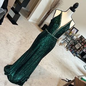 Green sequin long dress with split and zipper back. Size Large